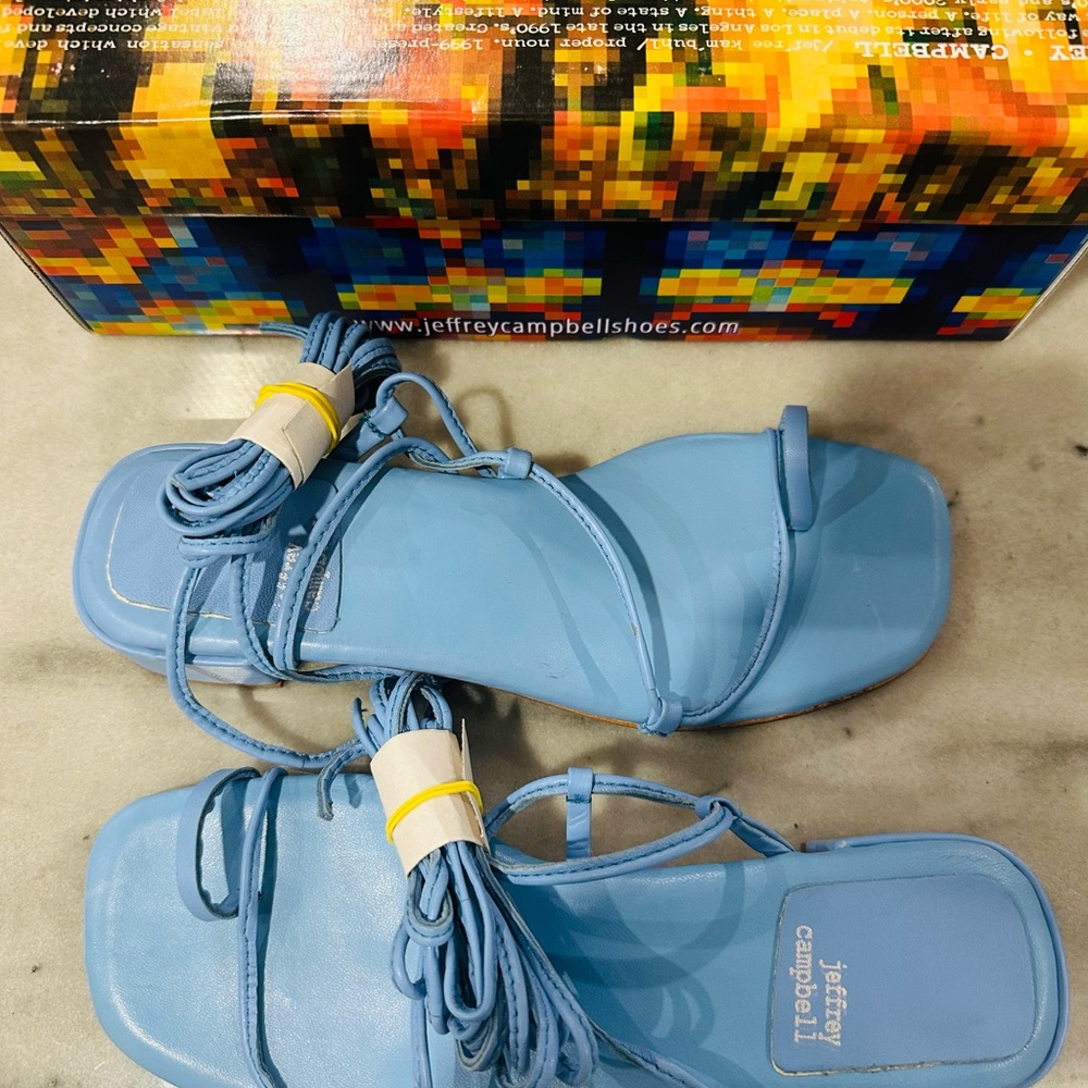 Jeffery Campbell sandals in sky blue.